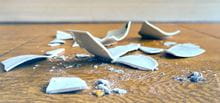 Close up of broken china on floor
